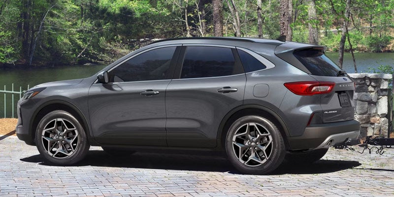 Rear three-quarter view of a gray Ford Escape