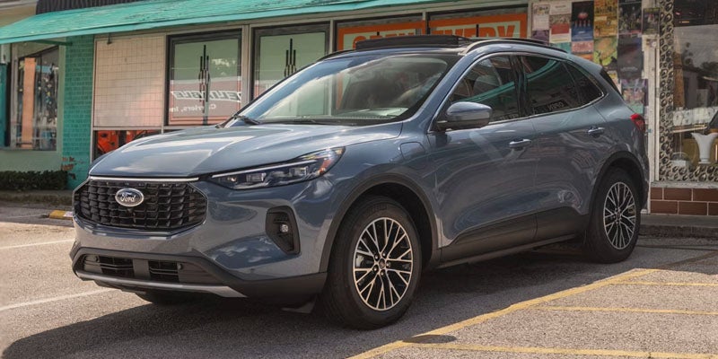 Front three-quarter view of a blue Ford Escape