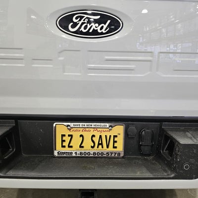 Ford F-150 tailgate with a Costco Auto Program EZ 2 SAVE license plate